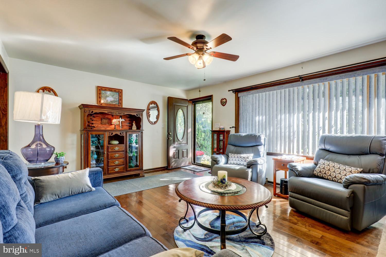 912 Perry Road Lititz, PA 17543 - Photo 8 of 50 a living room with furniture and a wooden floor
