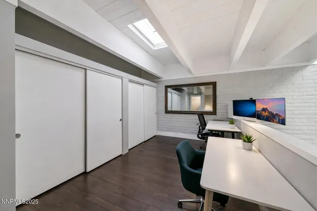 a view of a park that has large trees