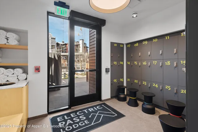 a view of a livingroom with furniture and front door
