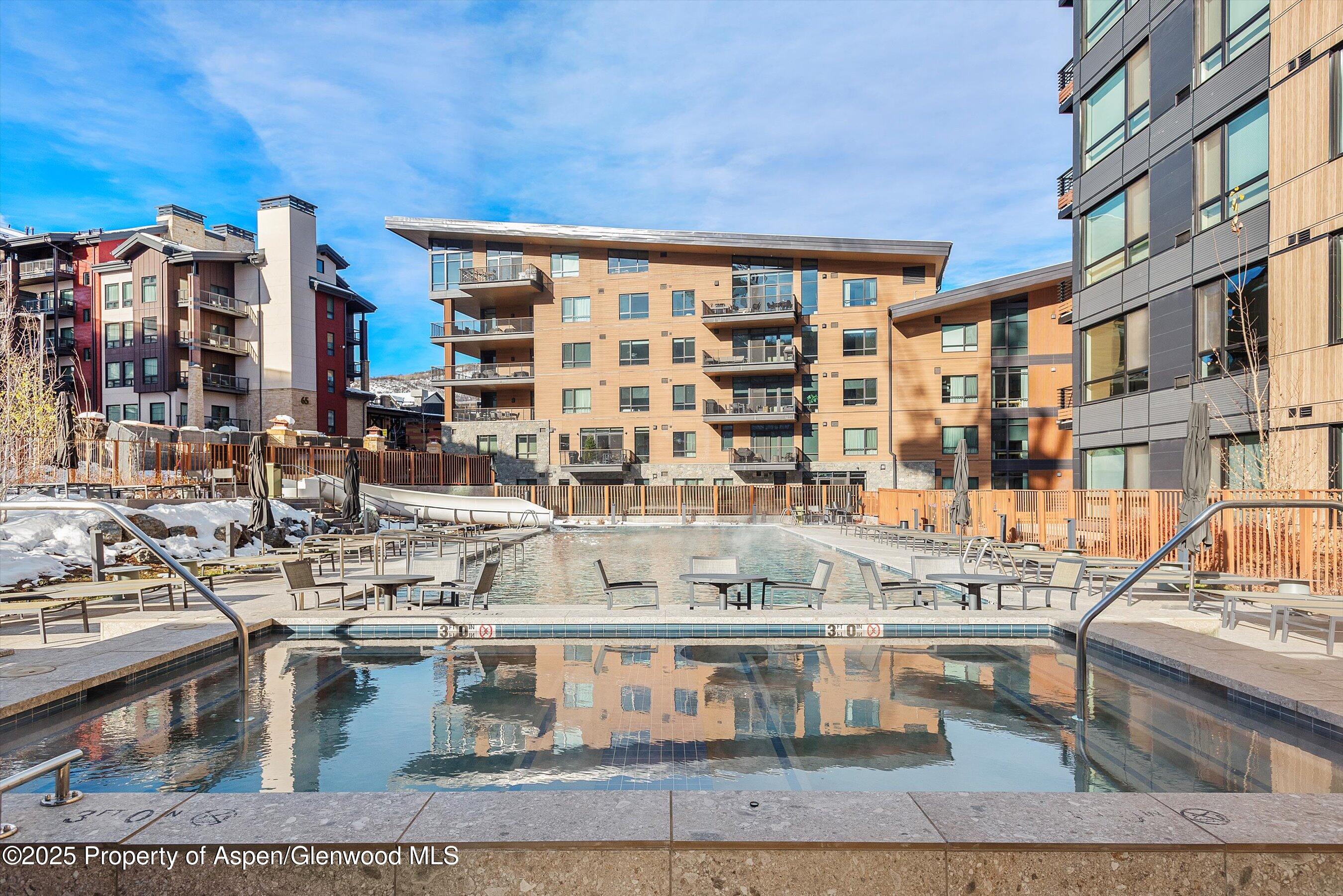 119 Wood Road, Unit 303 Snowmass Village, CO 81615 - Photo 19 of 30 a picture of a building with sitting area
