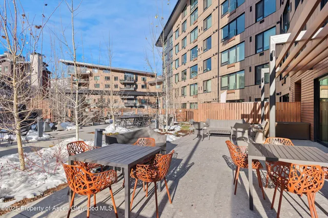 an outdoor space with patio lots of furniture