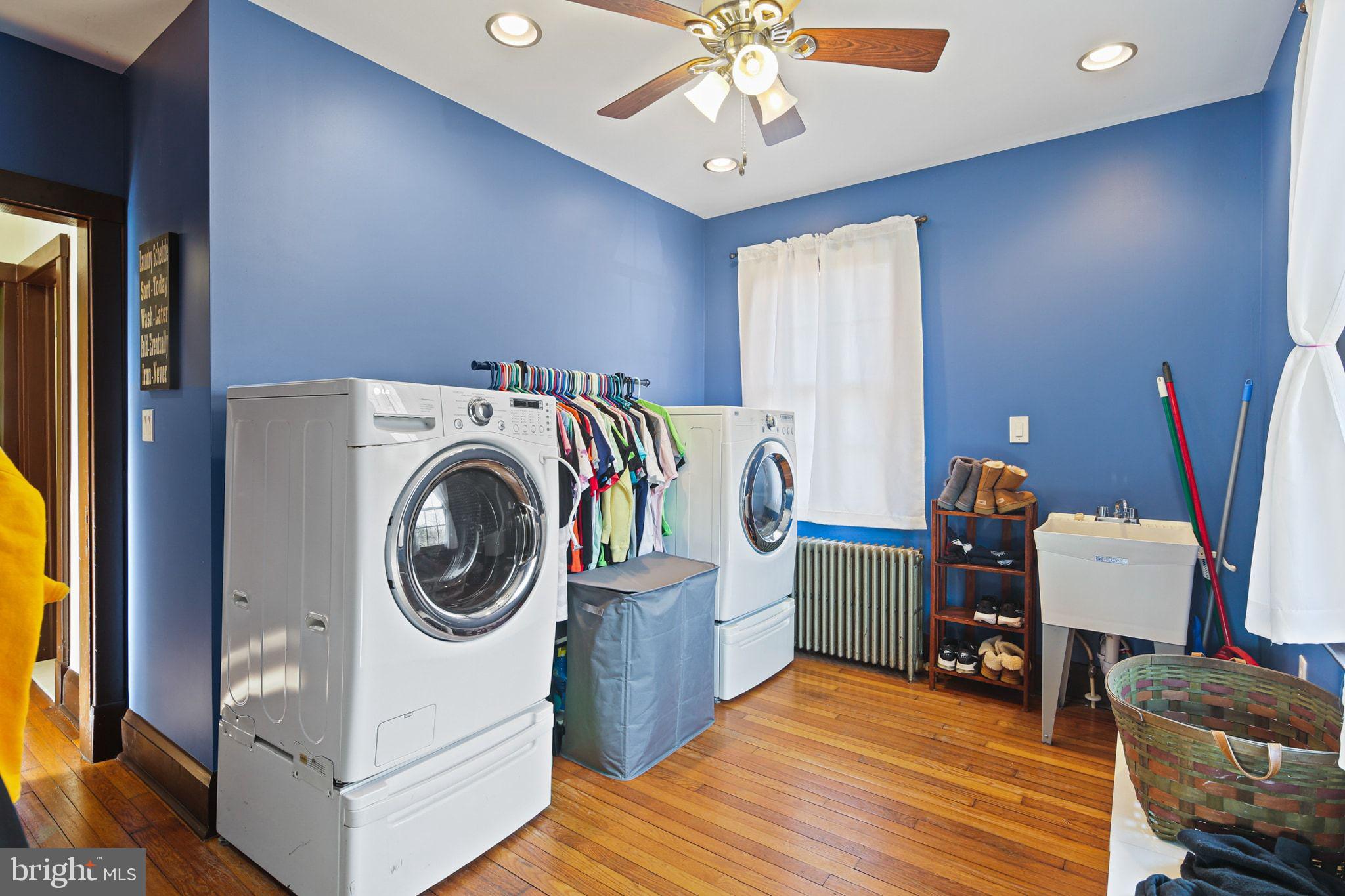11850 Ramsburg Road Marriottsville, MD 21104 - Photo 19 of 49 a bedroom with a bed and a chandelier