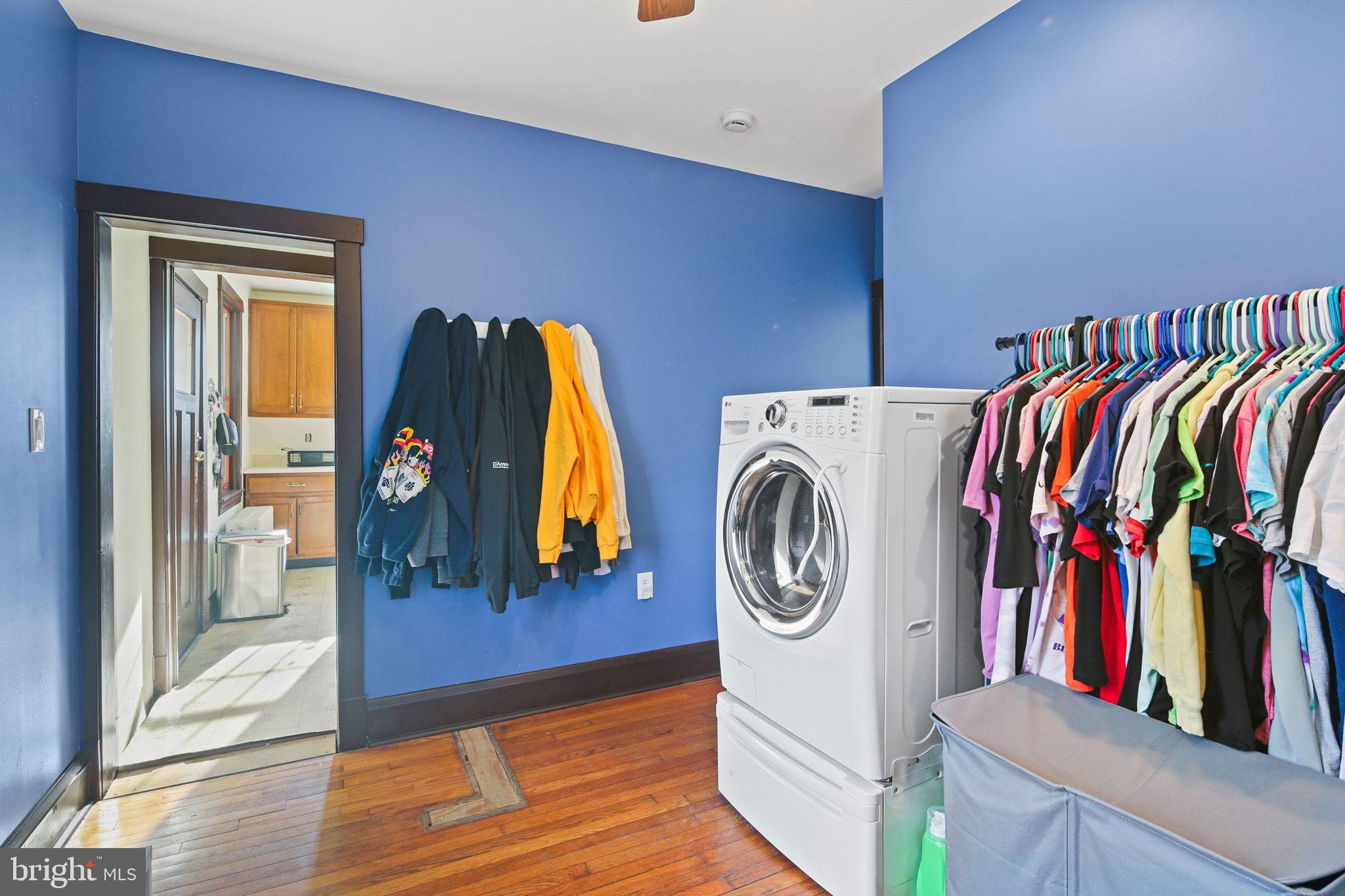 11850 Ramsburg Road Marriottsville, MD 21104 - Photo 20 of 49 a view of walk in closet with clothes and shoes