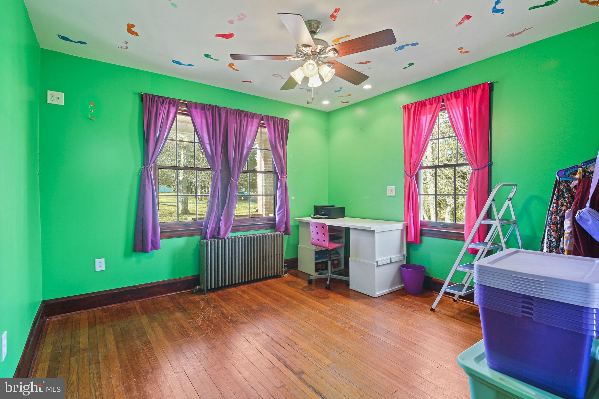 11850 Ramsburg Road Marriottsville, MD 21104 - Photo 22 of 49 a room with furniture and a window