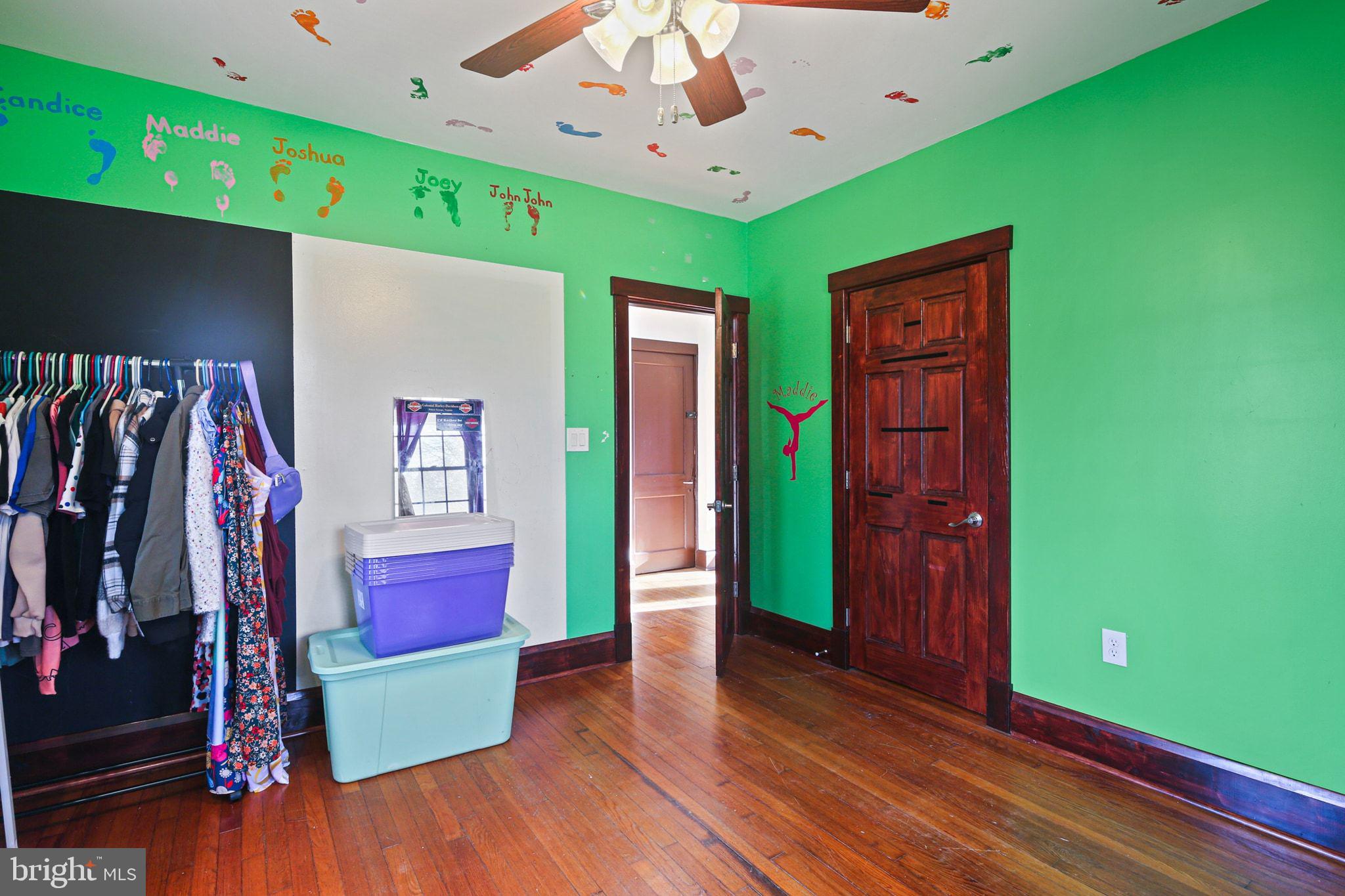 11850 Ramsburg Road Marriottsville, MD 21104 - Photo 23 of 49 a living room with furniture and a flat screen tv