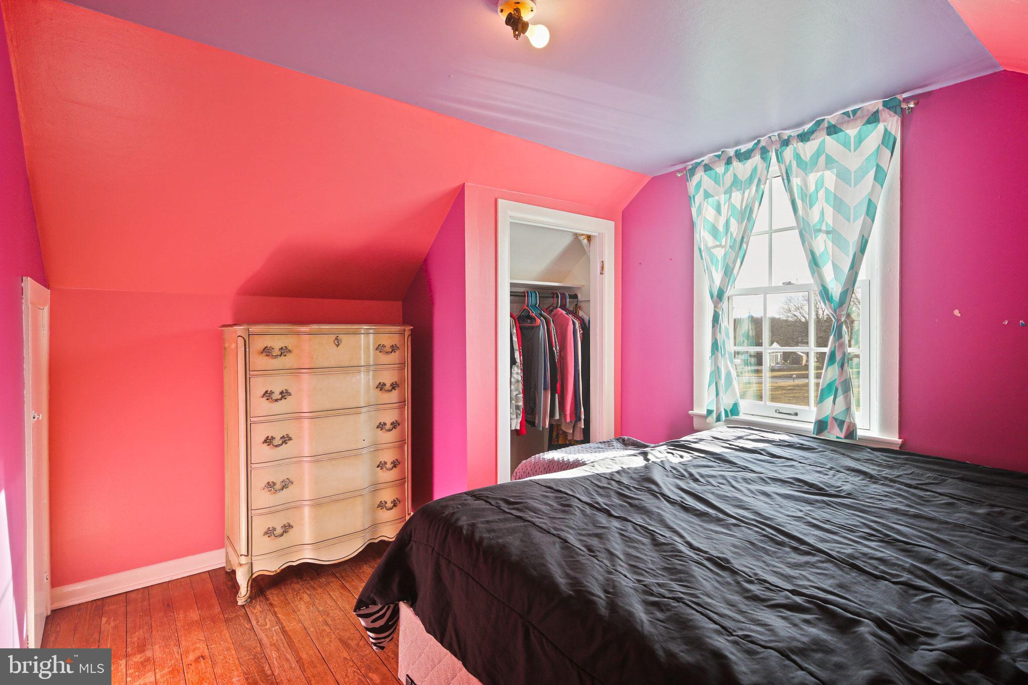 11850 Ramsburg Road Marriottsville, MD 21104 - Photo 24 of 49 a bedroom with a bed and a window