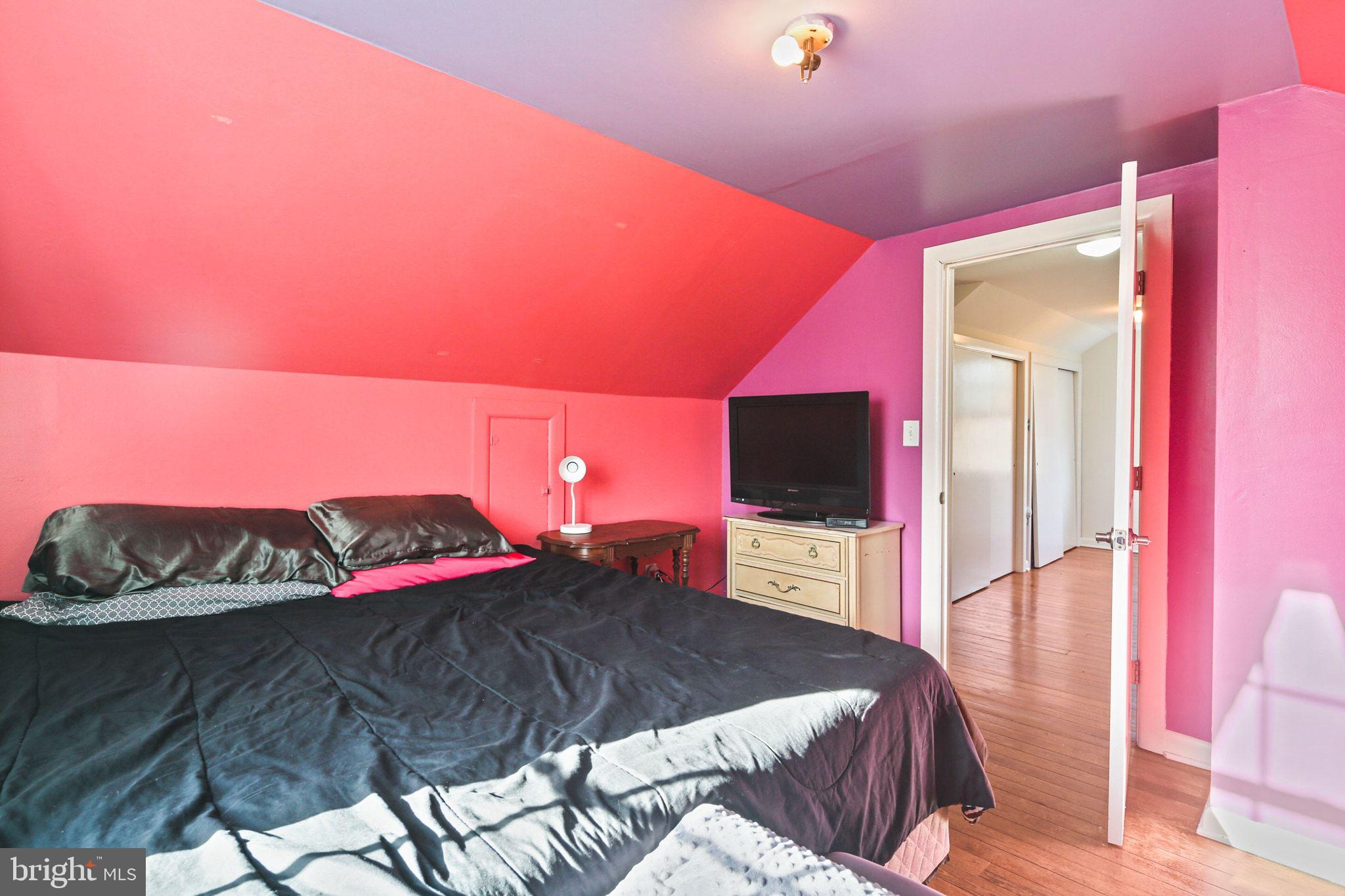 11850 Ramsburg Road Marriottsville, MD 21104 - Photo 25 of 49 a bedroom with a bed and a flat screen tv