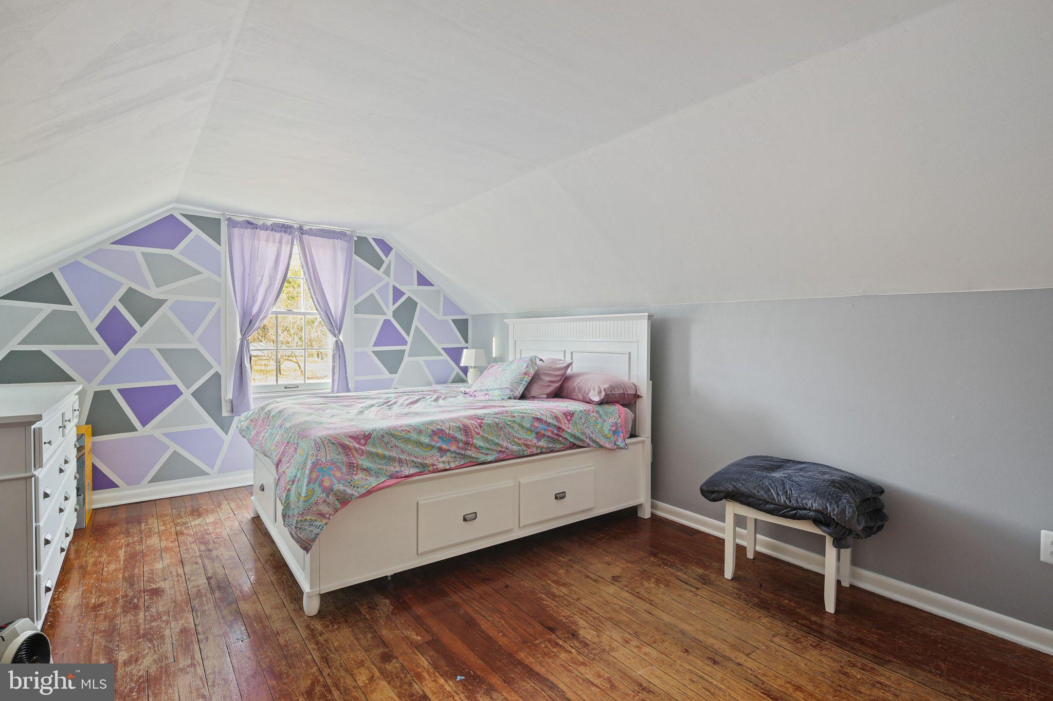 11850 Ramsburg Road Marriottsville, MD 21104 - Photo 26 of 49 a bedroom with a bed and a chair