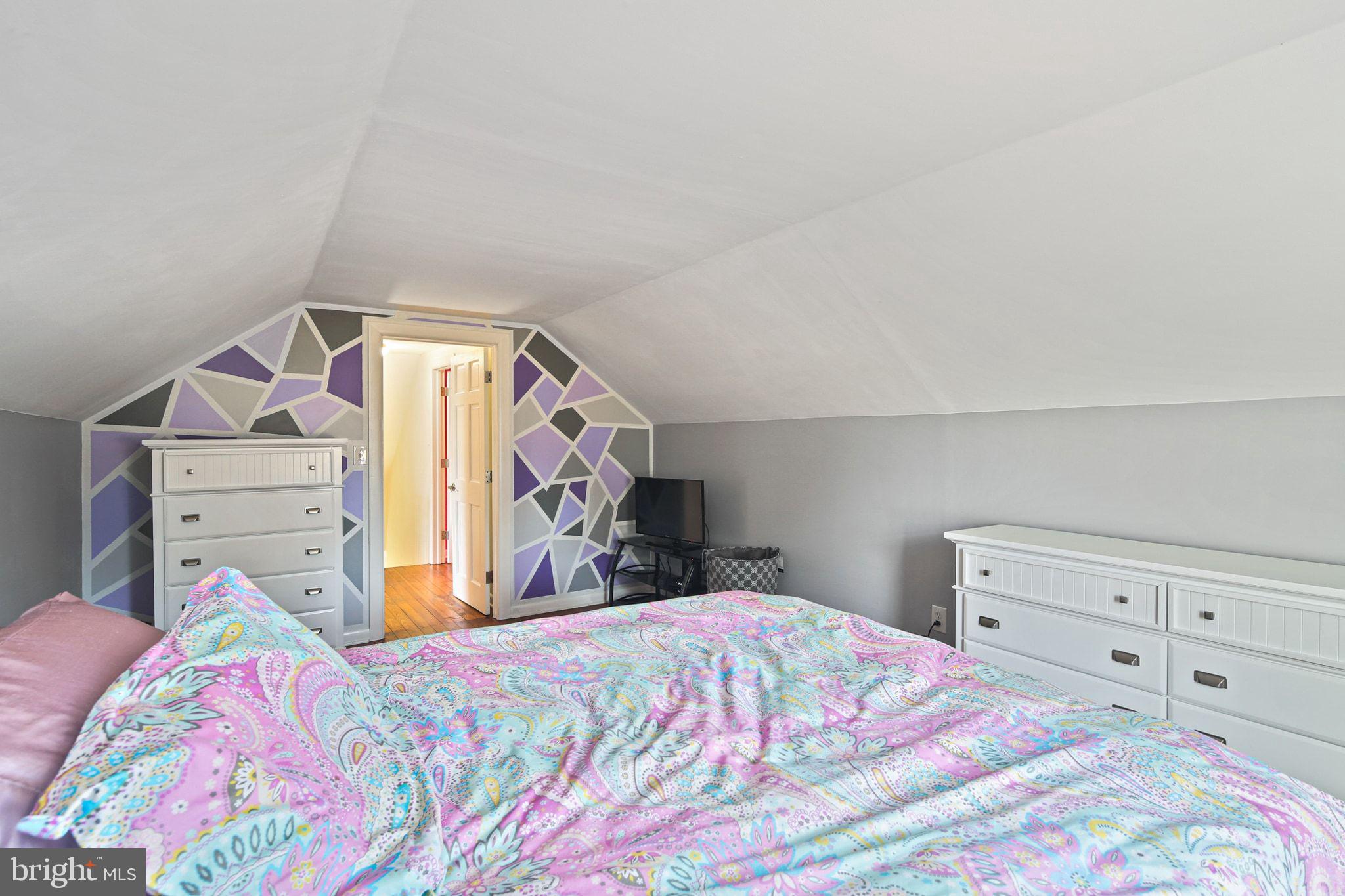 11850 Ramsburg Road Marriottsville, MD 21104 - Photo 27 of 49 a bedroom with a bed and a mirror