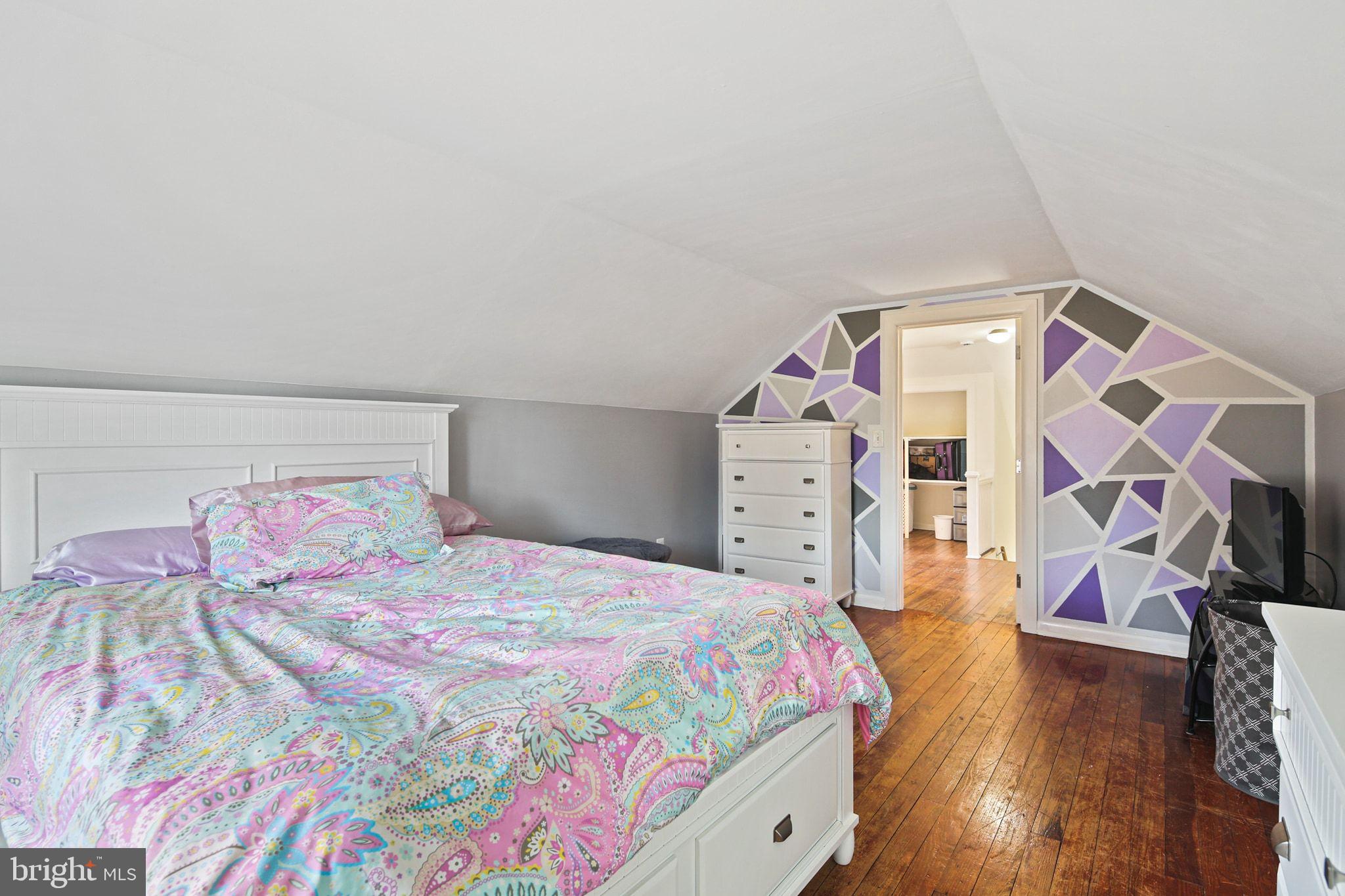 11850 Ramsburg Road Marriottsville, MD 21104 - Photo 28 of 49 a bedroom with a bed and a walk in closet