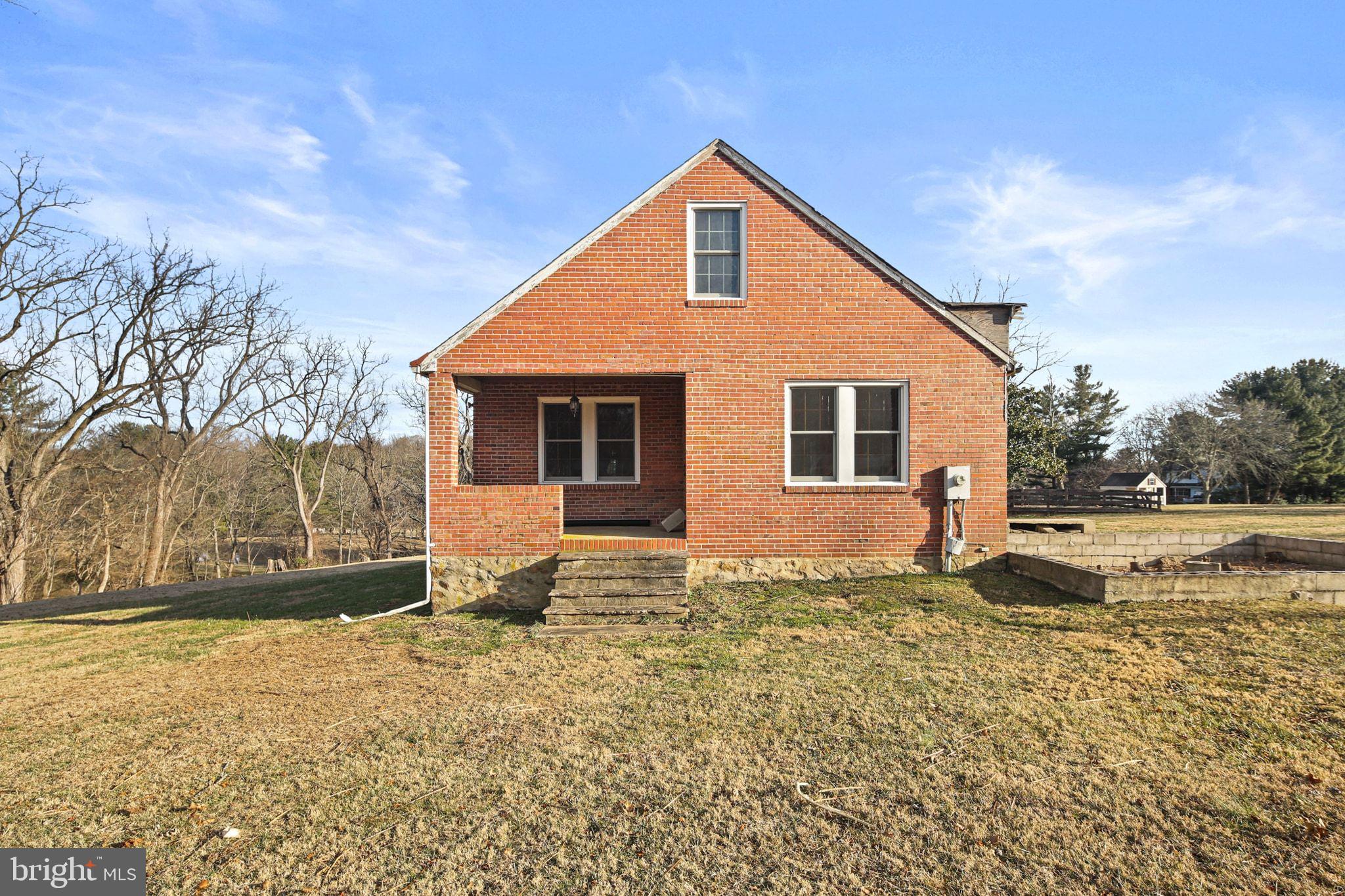 11850 Ramsburg Road Marriottsville, MD 21104 - Photo 3 of 49 a view of a house with a yard