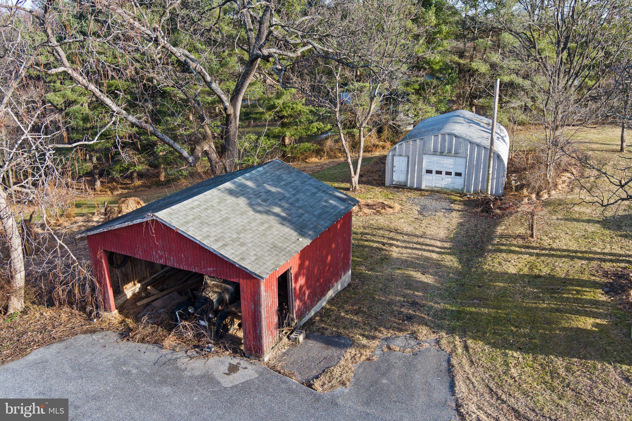 11850 Ramsburg Road Marriottsville, MD 21104 - Photo 33 of 49 a view of a house with a yard