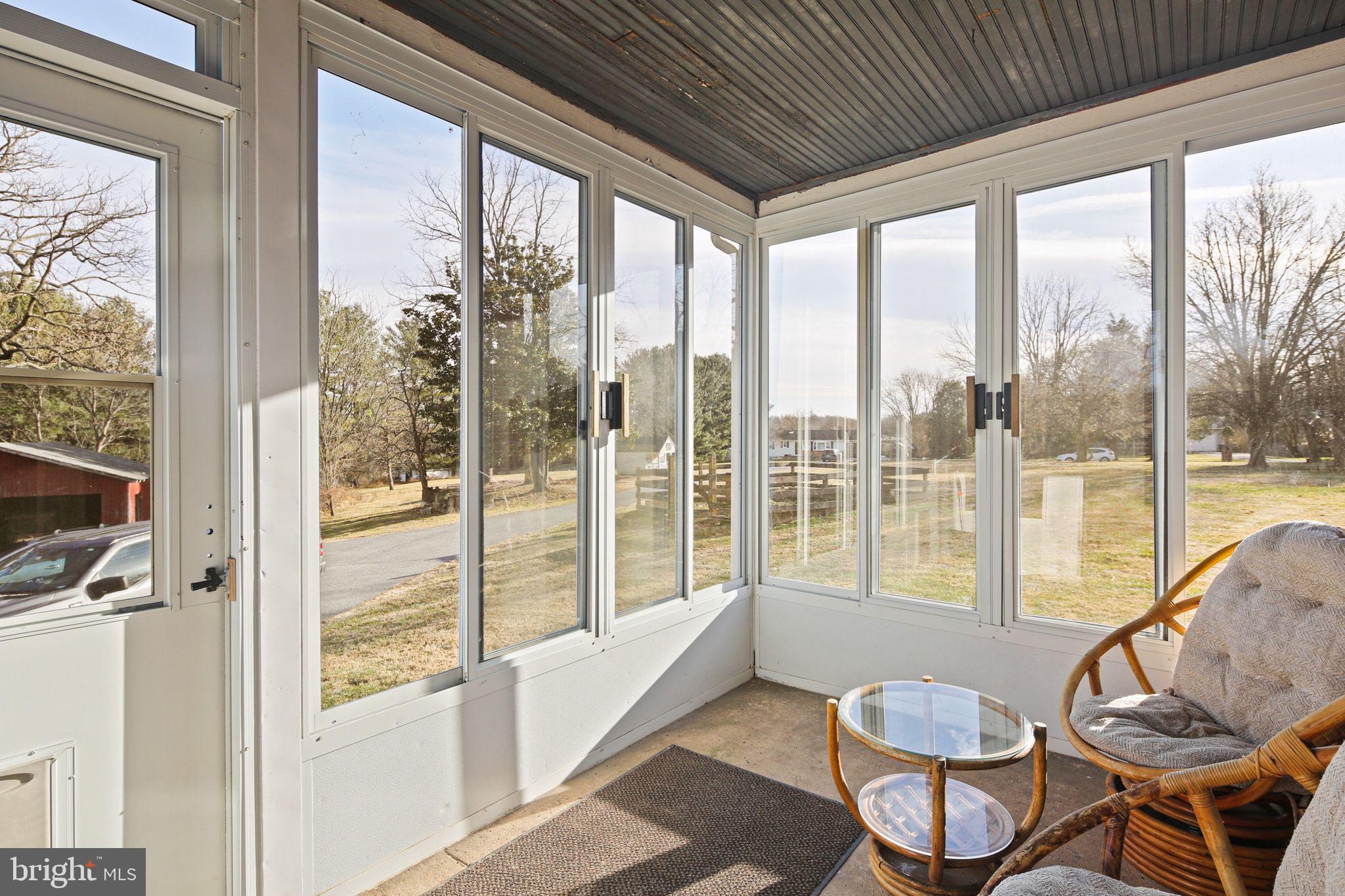 11850 Ramsburg Road Marriottsville, MD 21104 - Photo 37 of 49 a view of a room with furniture and a window