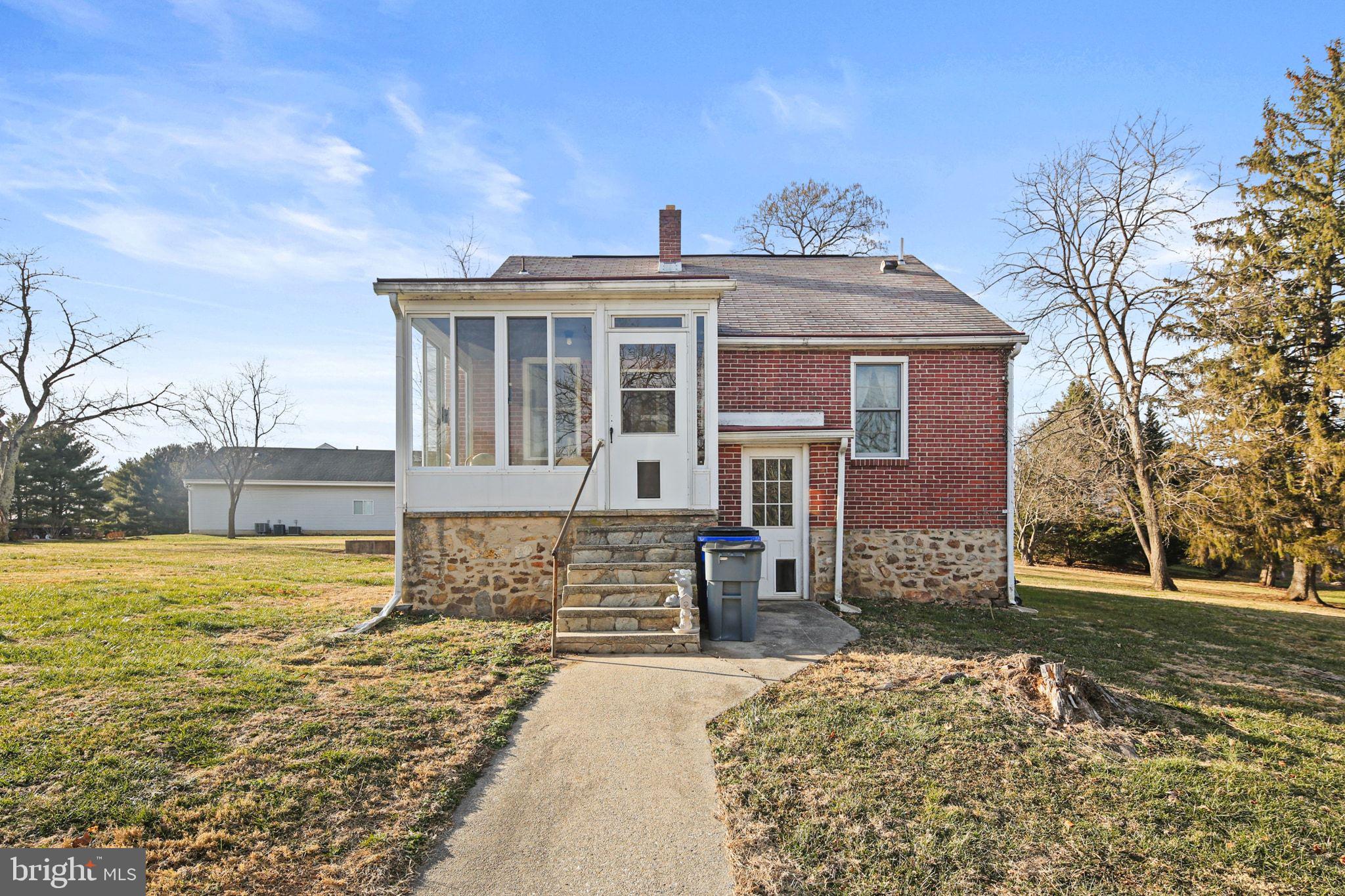 11850 Ramsburg Road Marriottsville, MD 21104 - Photo 5 of 49 a view of a house with a yard