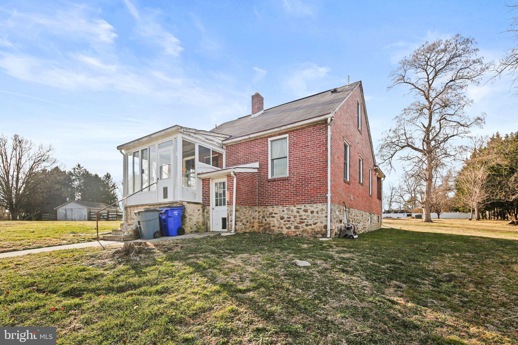 11850 Ramsburg Road Marriottsville, MD 21104 - Photo 6 of 49 a view of a house with a yard