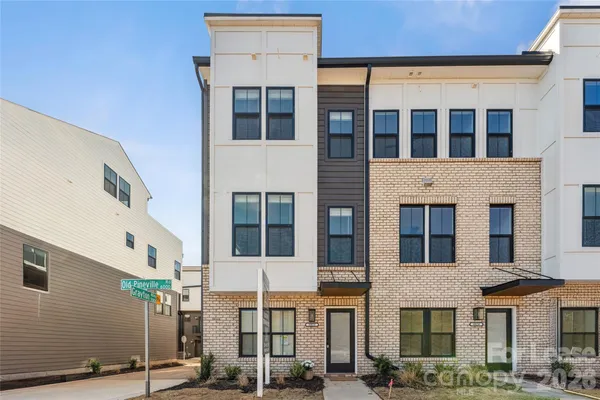a front view of a building with glass windows