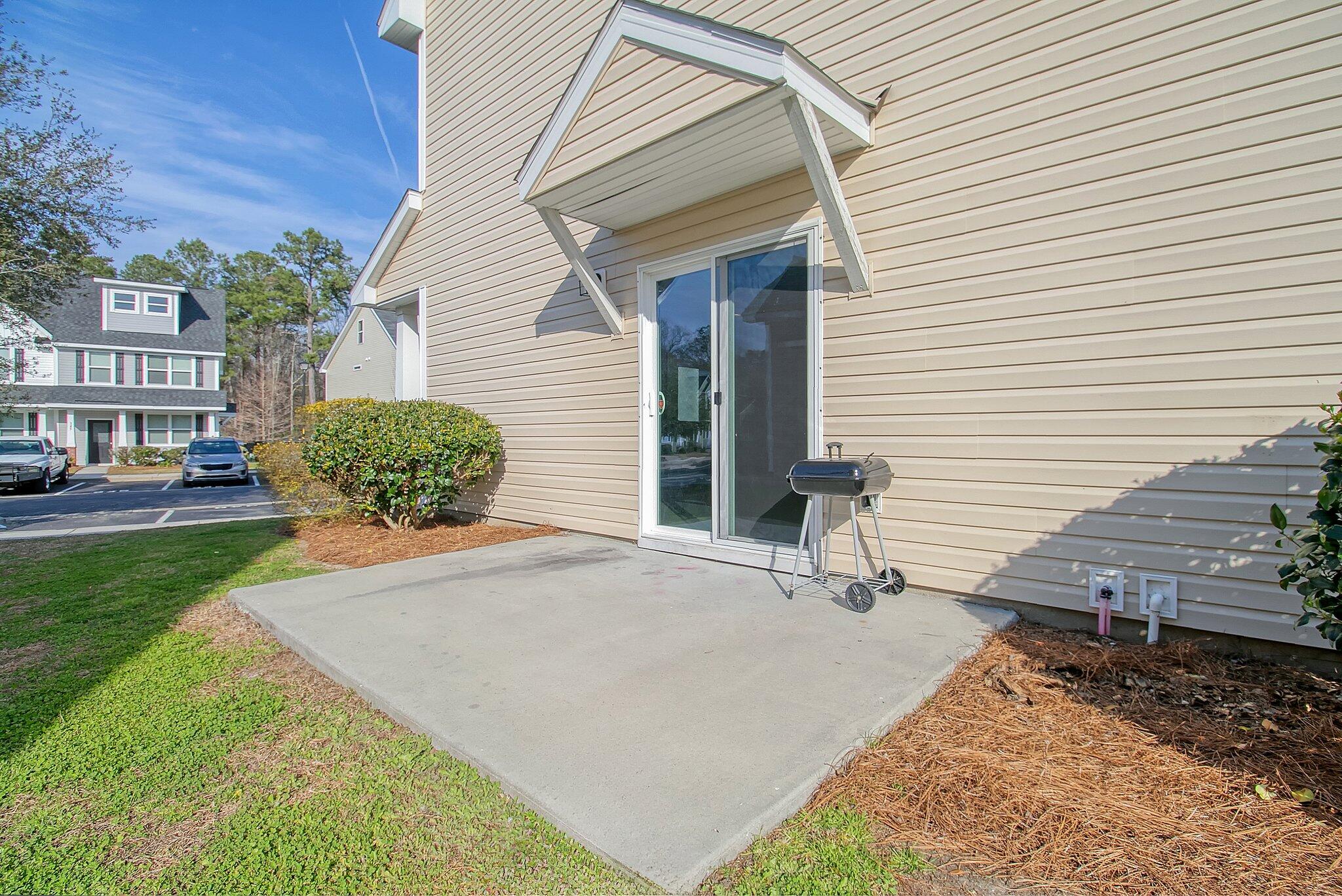 348 Flyway Road Goose Creek, SC 29445 - Photo 34 of 39 Side Patio Toward Front