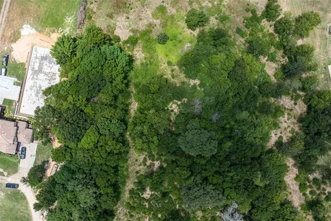 a view of a lake with a building in the background