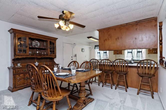 1702 Fitzgerald Road Simi Valley, CA 93065 - Photo 3 of 12 a view of a dining room with furniture
