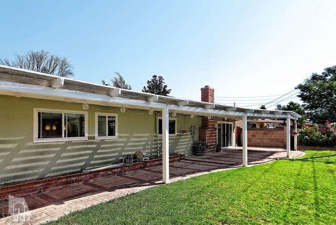 1702 Fitzgerald Road Simi Valley, CA 93065 - Photo 10 of 12 a view of a house with backyard