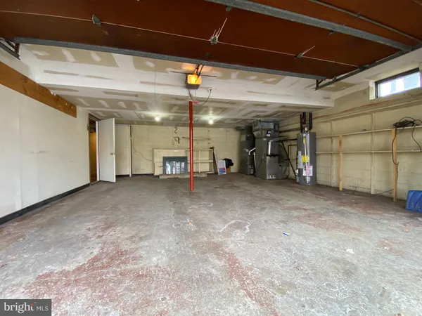 a view of a empty room with a utility room