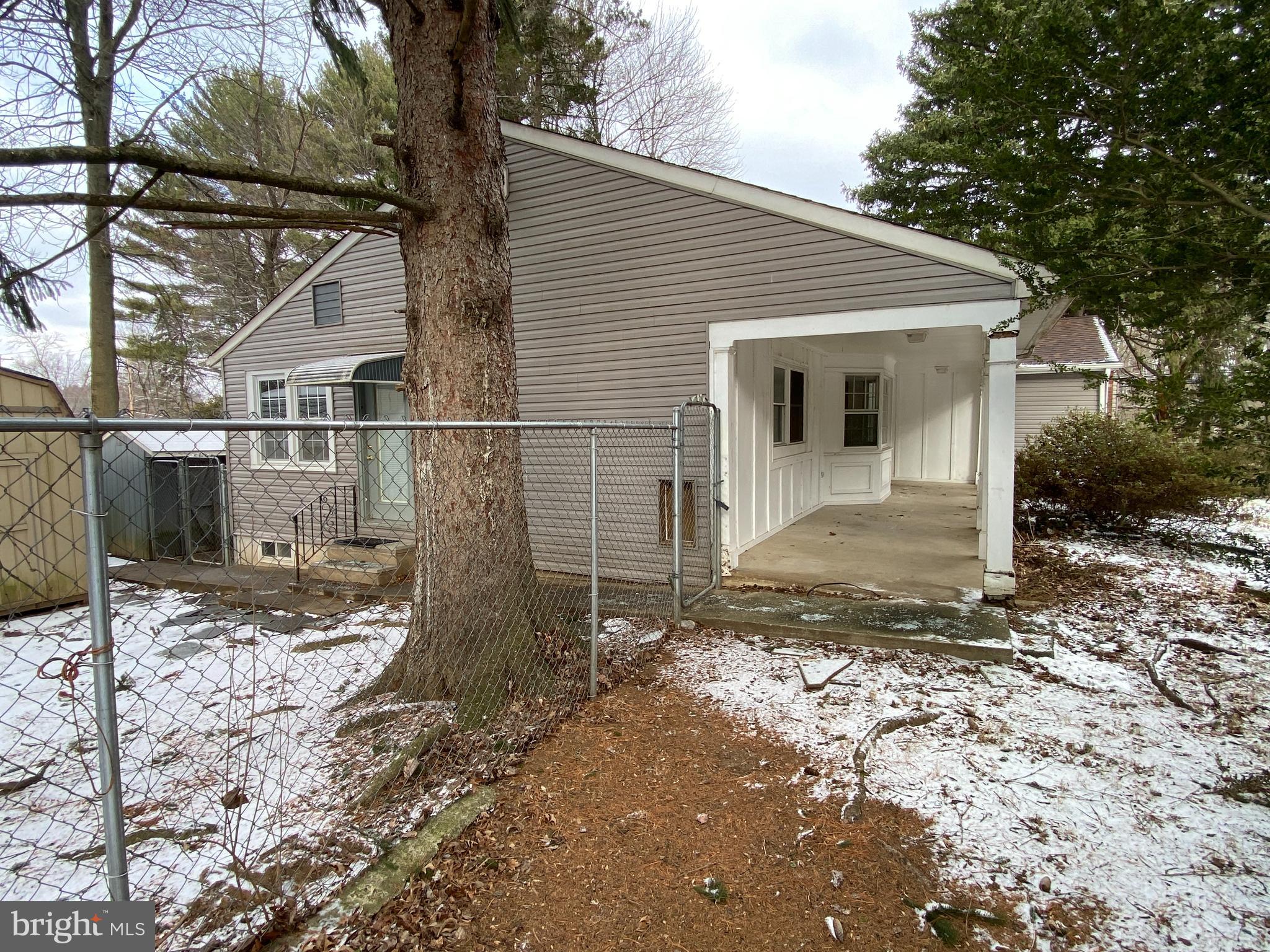 123 East Bristol Road Feasterville-Trevose, PA 19053 - Photo 4 of 21 a view of a small house with yard and garage
