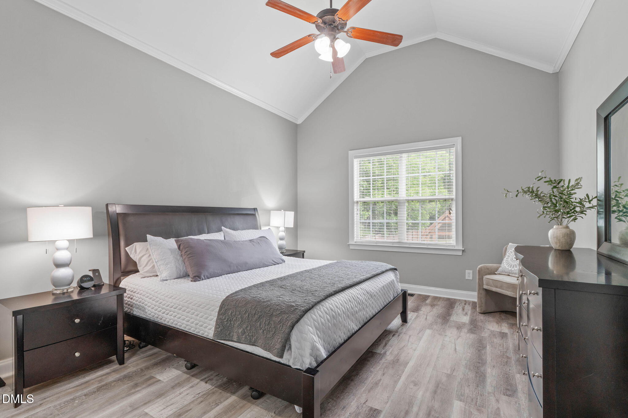 2450 Rolling Tracks Road Willow Spring, NC 27592 - Photo 27 of 64 a bedroom with a bed and a window