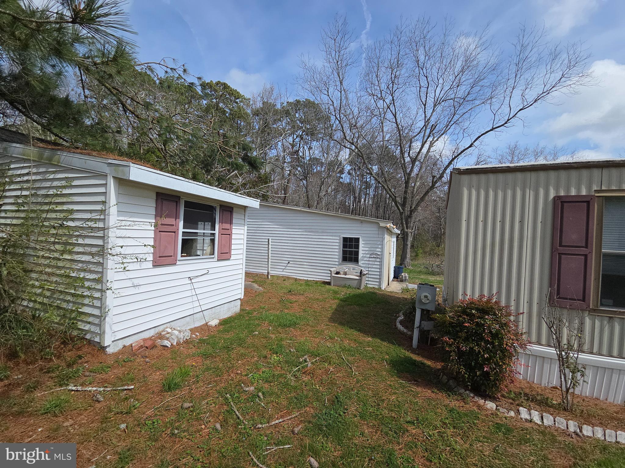 6945 Cherrix Road Girdletree, MD 21829 - Photo 4 of 20 storage shed and garage on the side