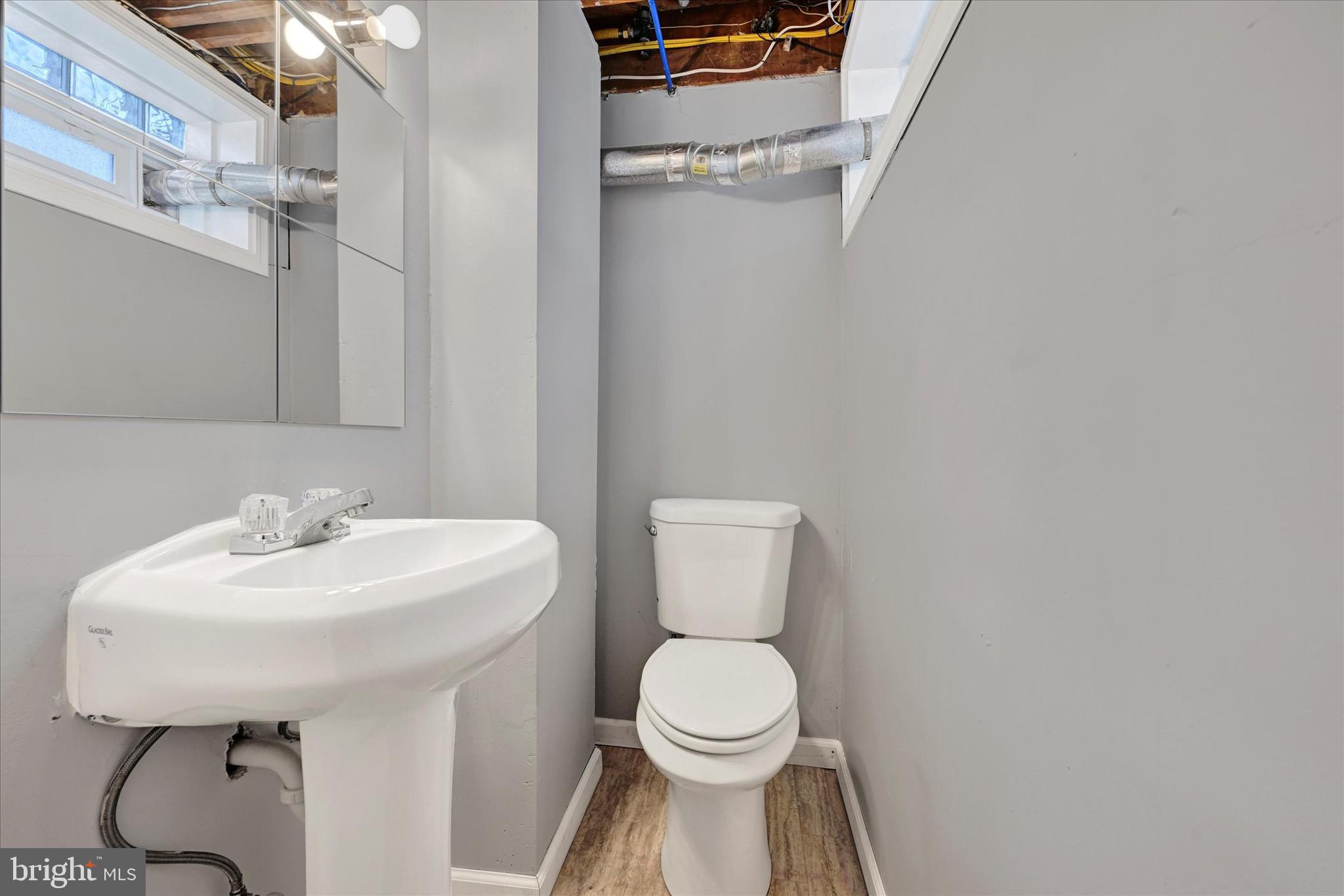 1536 Ramblewood Road Baltimore, MD 21239 - Photo 15 of 18 Lower Level Powder Room