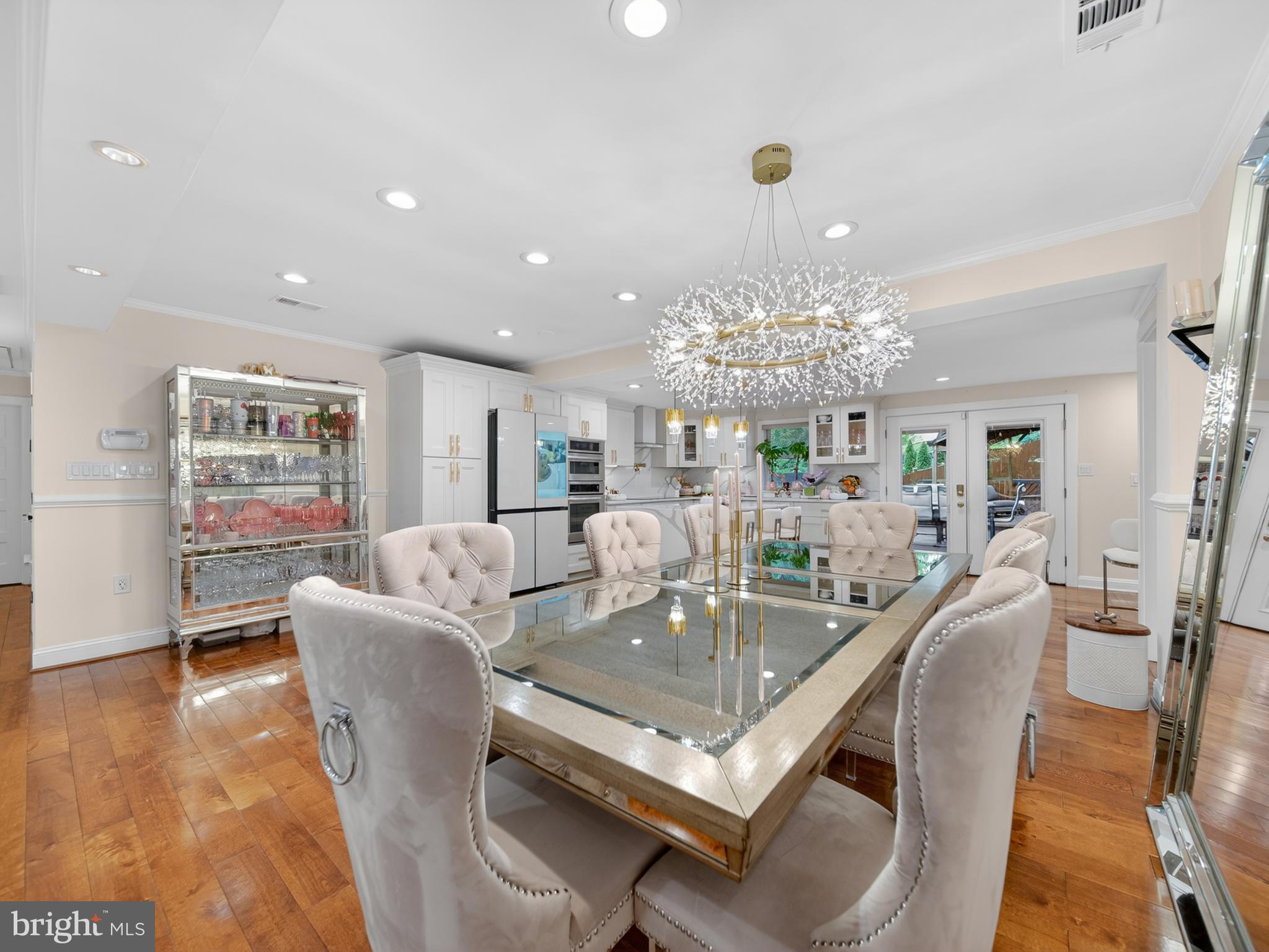 13427 Delaney Road Woodbridge, VA 22193 - Photo 16 of 57 a view of a dining room with furniture and wooden floor