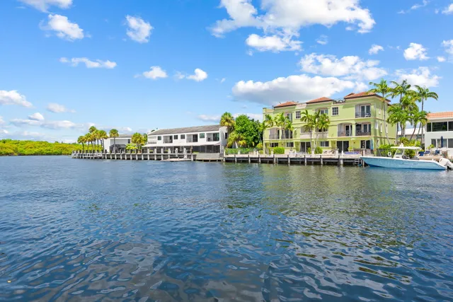 a view of a lake with a building in the background