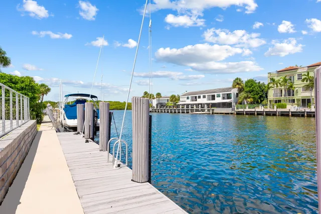 a view of a balcony with chairs