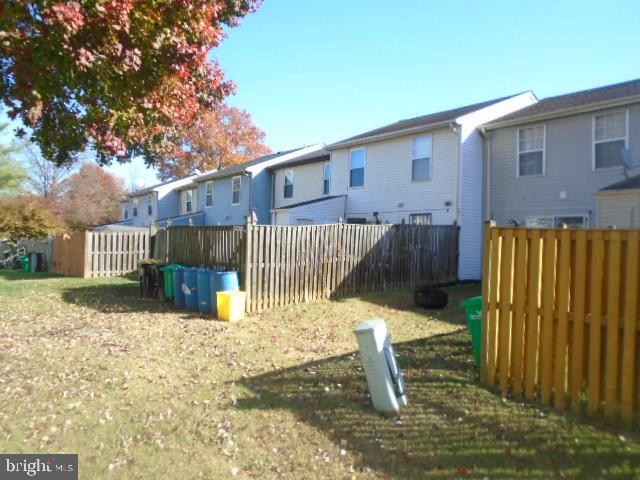109 Kettering Drive Upper Marlboro, MD 20774 - Photo 14 of 15 a view of a backyard with a tree