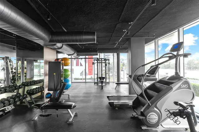 a view of a room with gym equipment