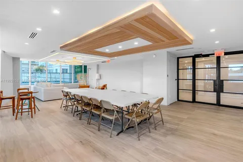 a room with furniture and wooden floors