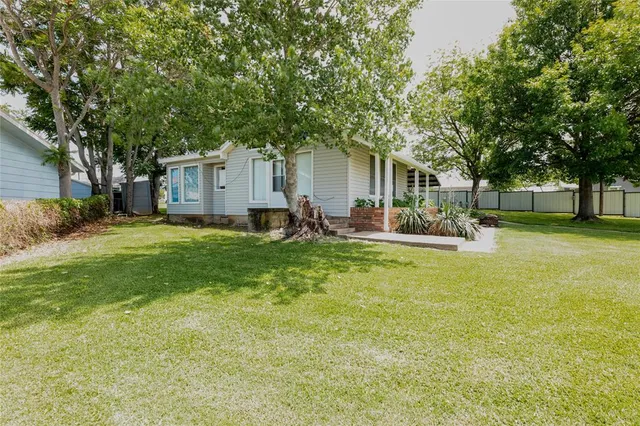 a view of a house with a garage