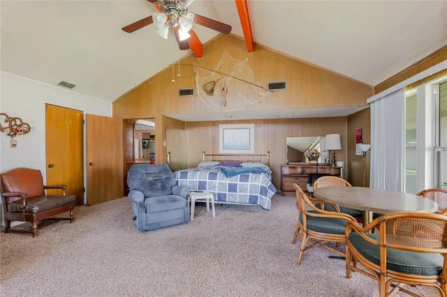 a kitchen with granite countertop a sink and a stove