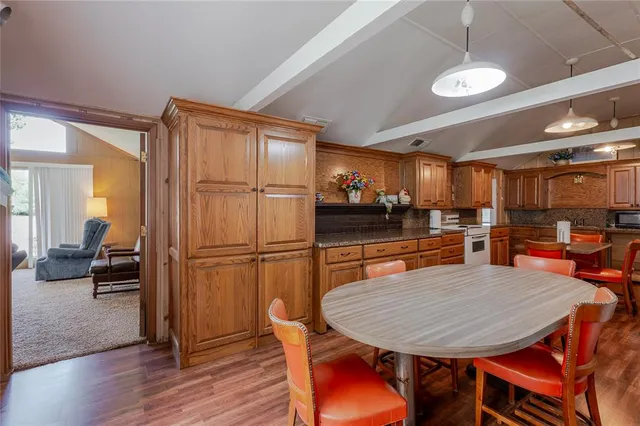 a view of a dining room with furniture