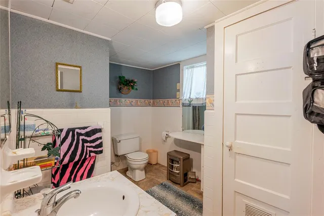 a bathroom with a sink and a shower