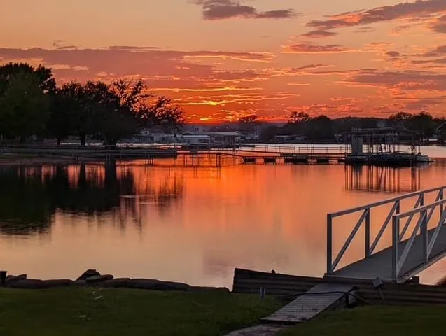a view of a lake from a yard