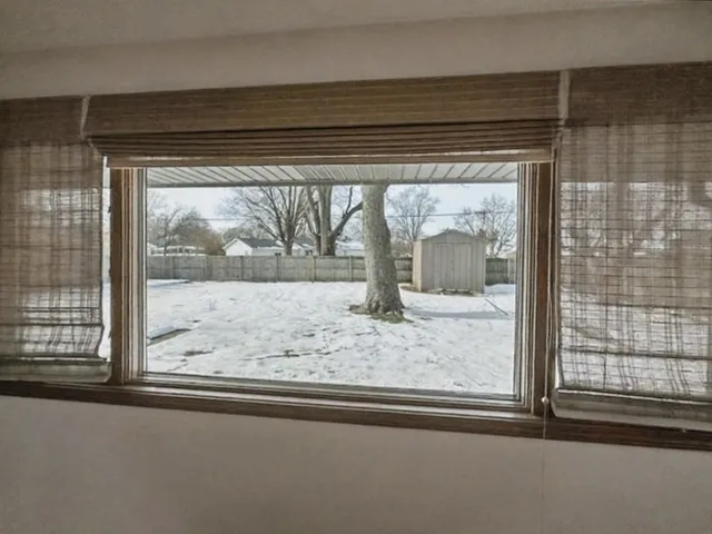 a view of a room that has a window