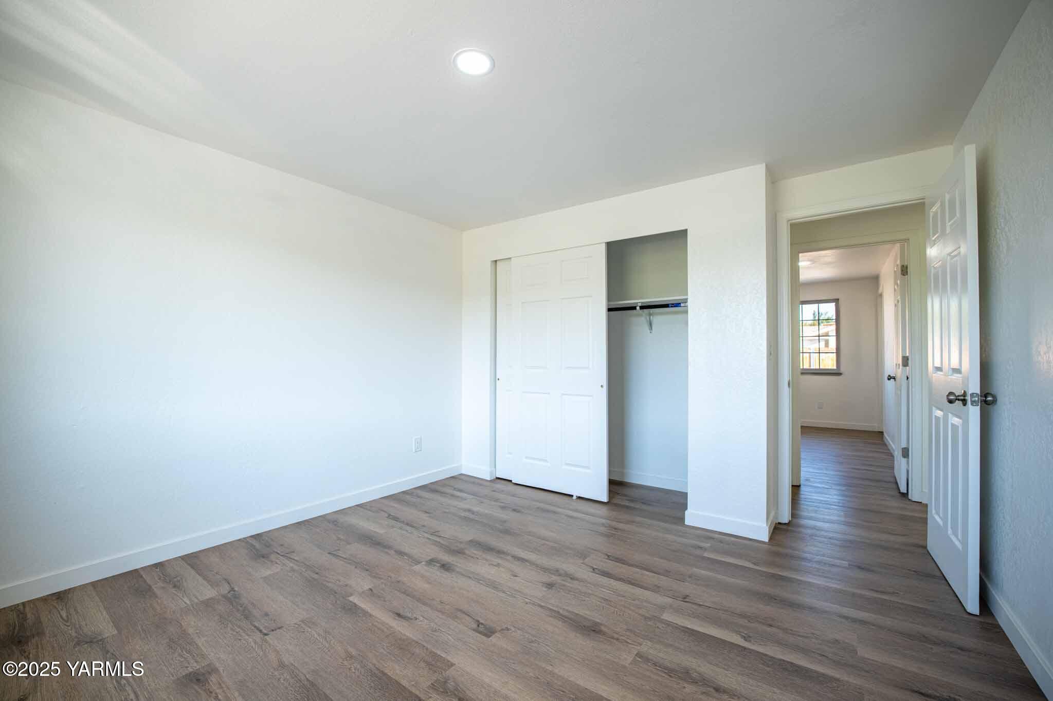 4711 Carol Avenue Yakima, WA 98908 - Photo 13 of 28 wooden floor in an empty room