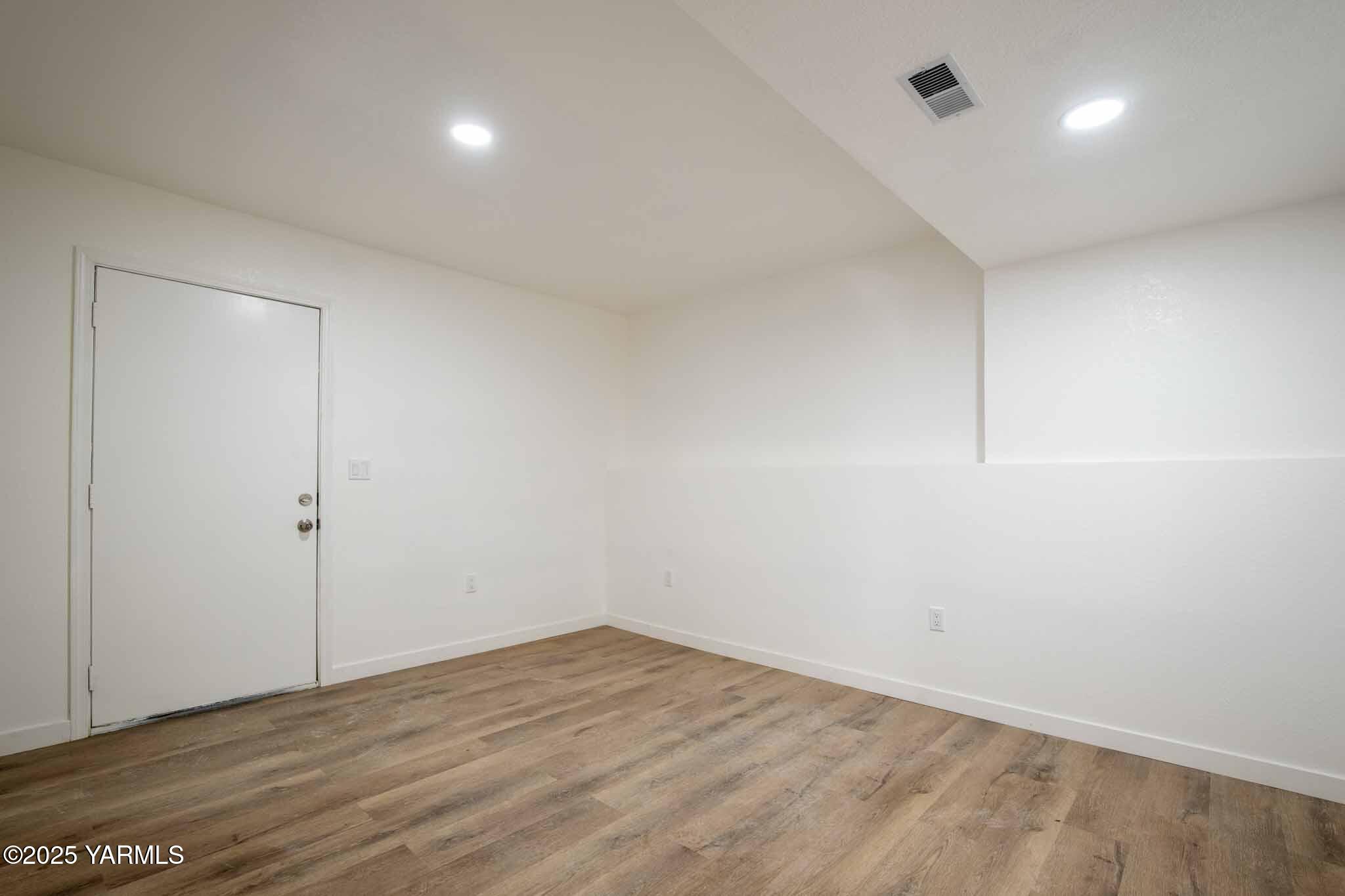 4711 Carol Avenue Yakima, WA 98908 - Photo 22 of 28 wooden floor in an empty room