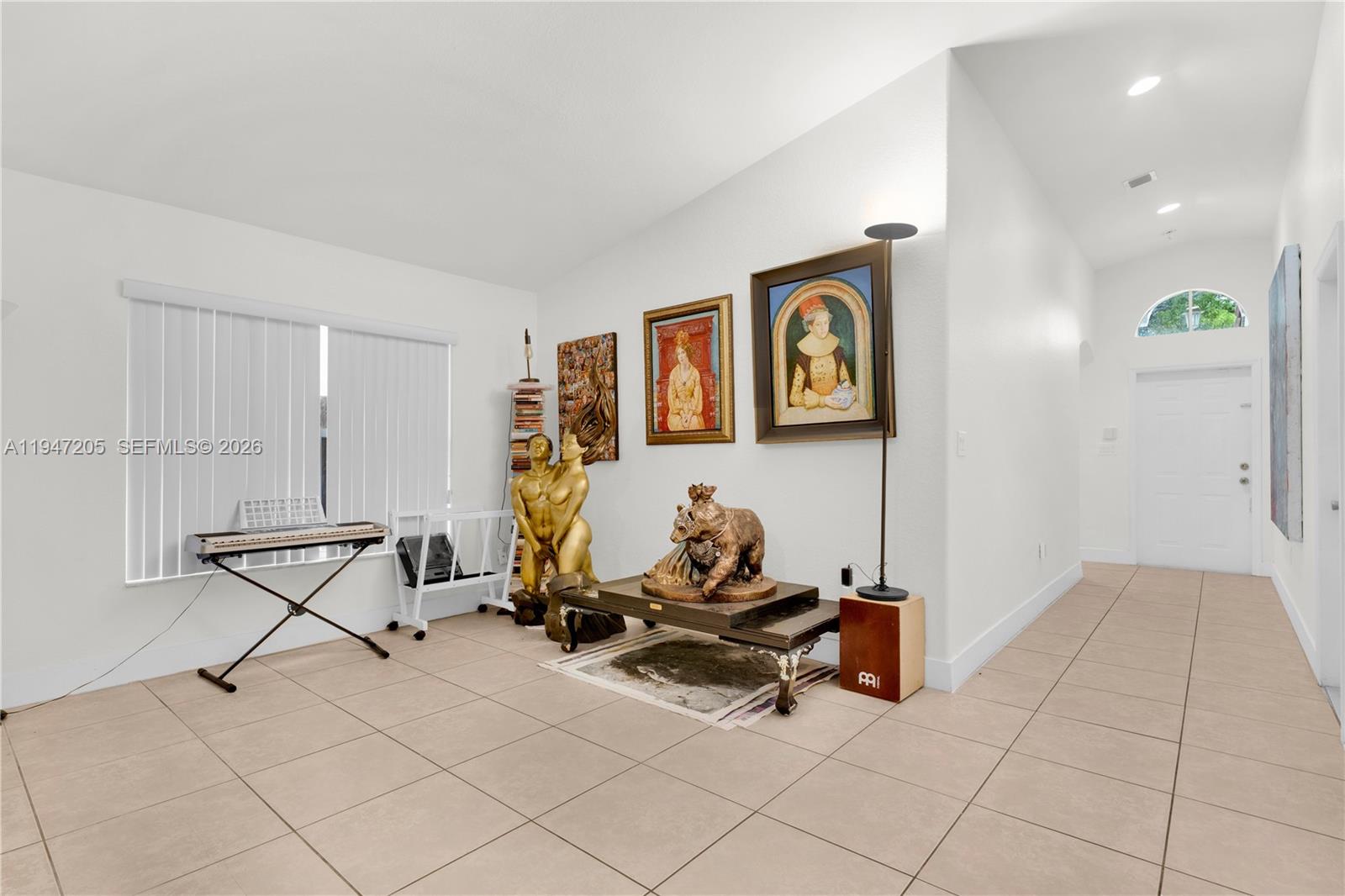 1959 Southeast 10th Street Homestead, FL 33035 - Photo 16 of 39 a room with gym equipment and a view of living room