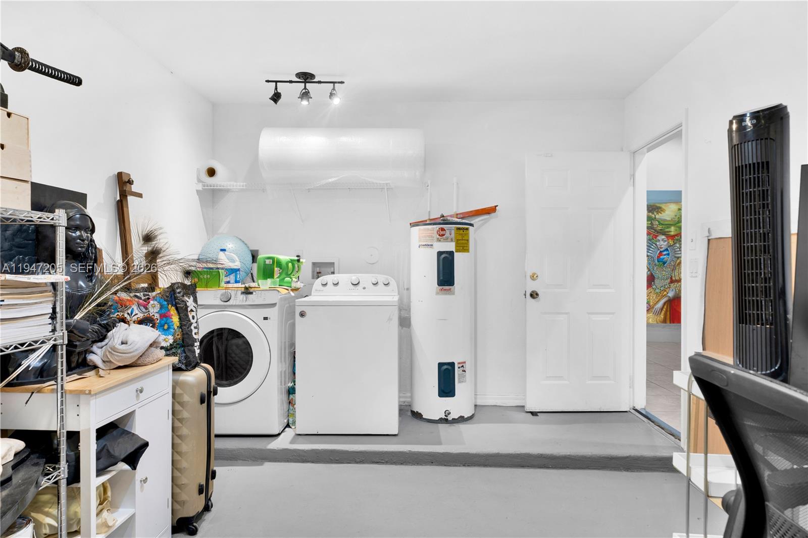 1959 Southeast 10th Street Homestead, FL 33035 - Photo 19 of 39 a utility room with dryer and washer