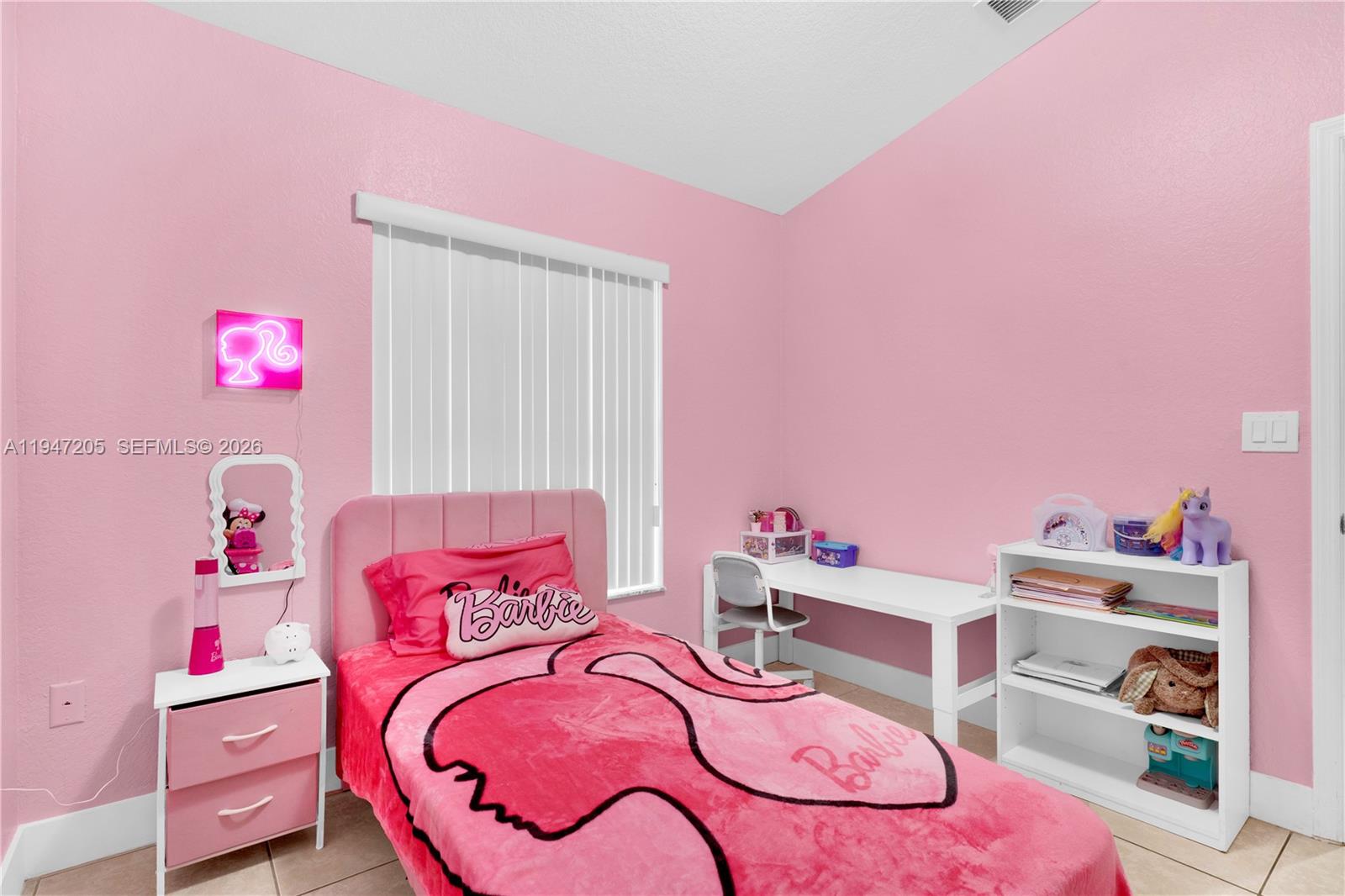 1959 Southeast 10th Street Homestead, FL 33035 - Photo 4 of 39 a bed room with a bed and a closet