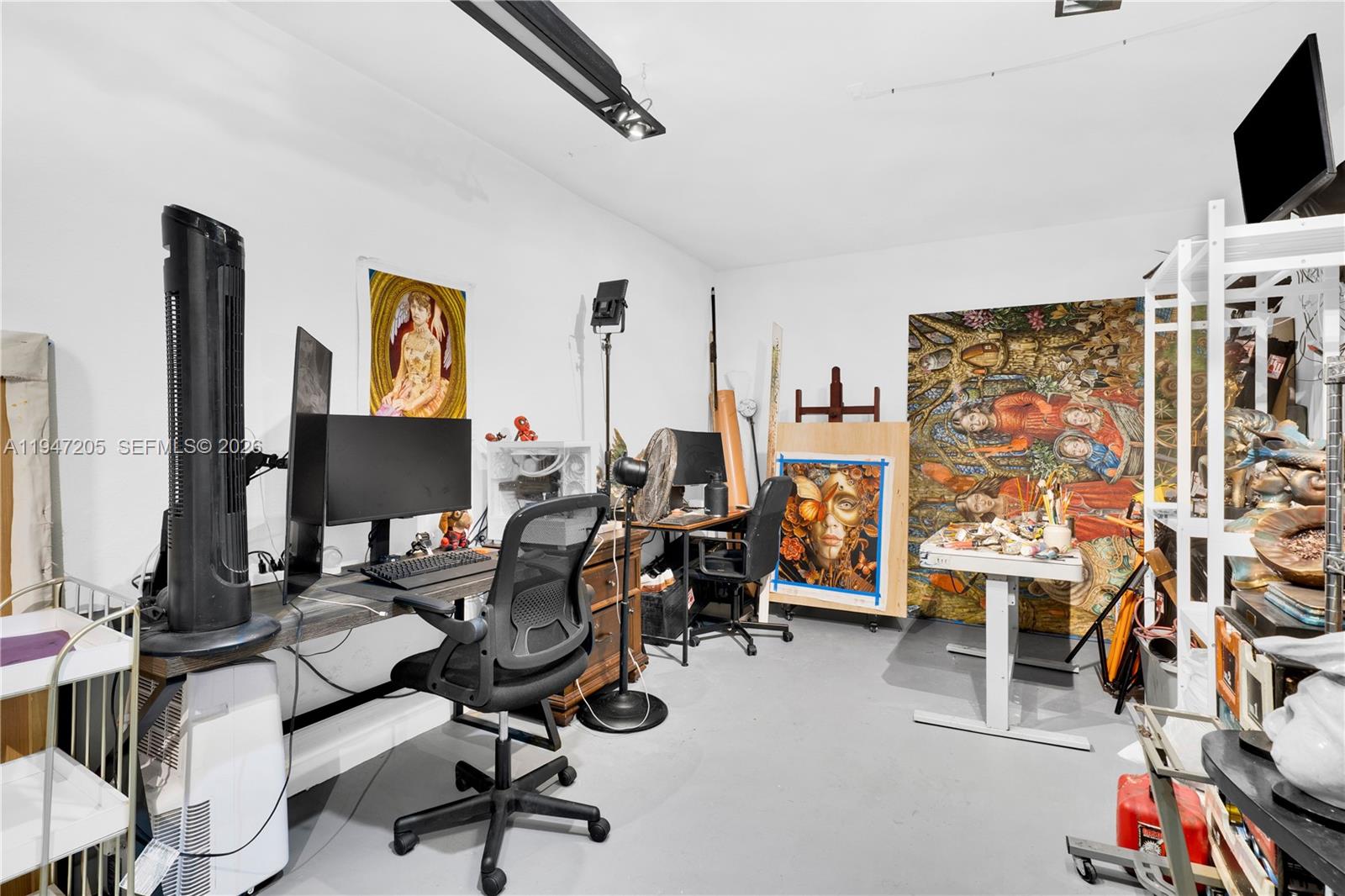 1959 Southeast 10th Street Homestead, FL 33035 - Photo 7 of 39 a view of a livingroom with workspace and a window