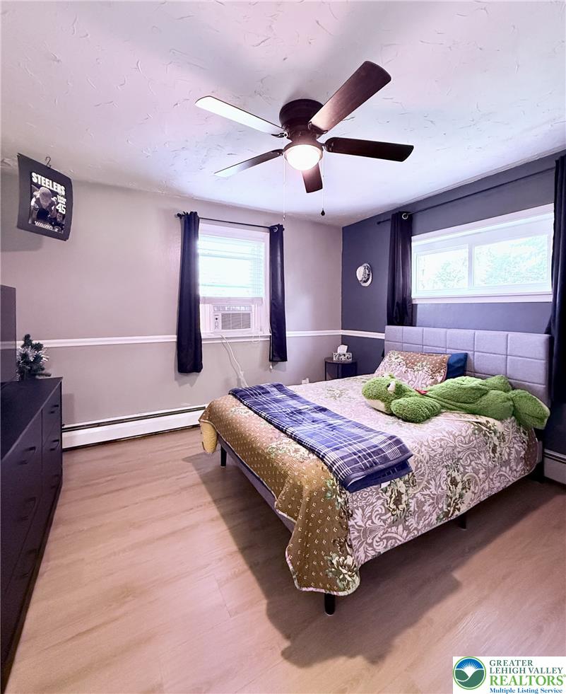 1275 Macada Road Bethlehem, PA 18017 - Photo 58 of 87 a bedroom with a large bed and a large window