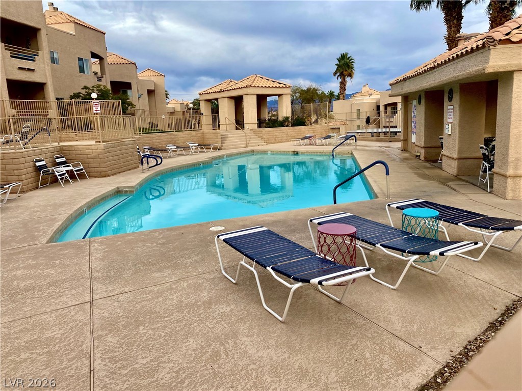 2160 Highpointe Drive, Unit 102 Laughlin, NV 89029 - Photo 25 of 28 Community pool featuring a gazebo, a patio, and a residential view