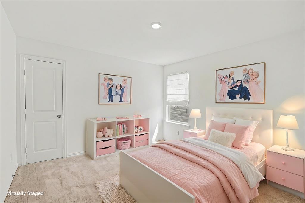 10004 Thornapple Road Fort Worth, TX 76179 - Photo 25 of 39 a bedroom with a bed and a painting on the wall